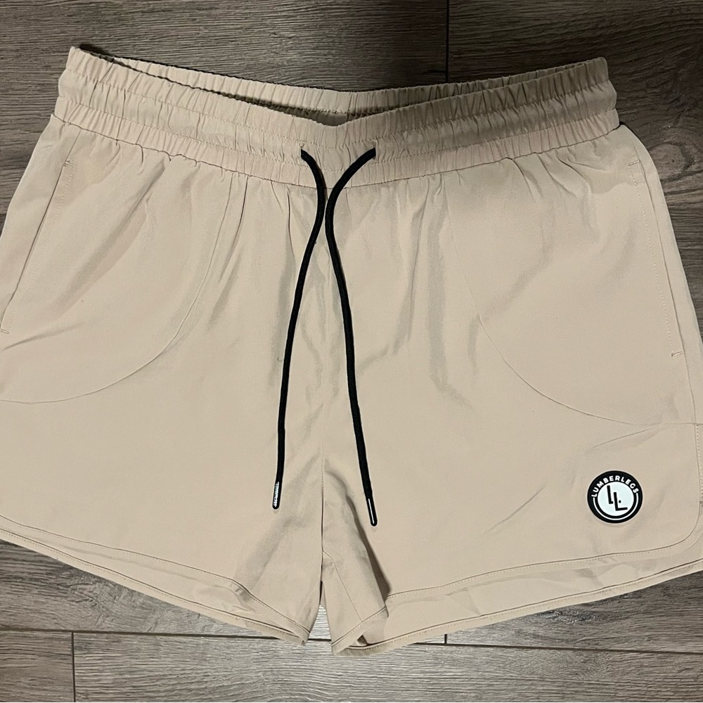 Lumber Legs “cream” gym shorts
